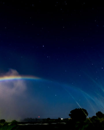 Moonbow in the night sky