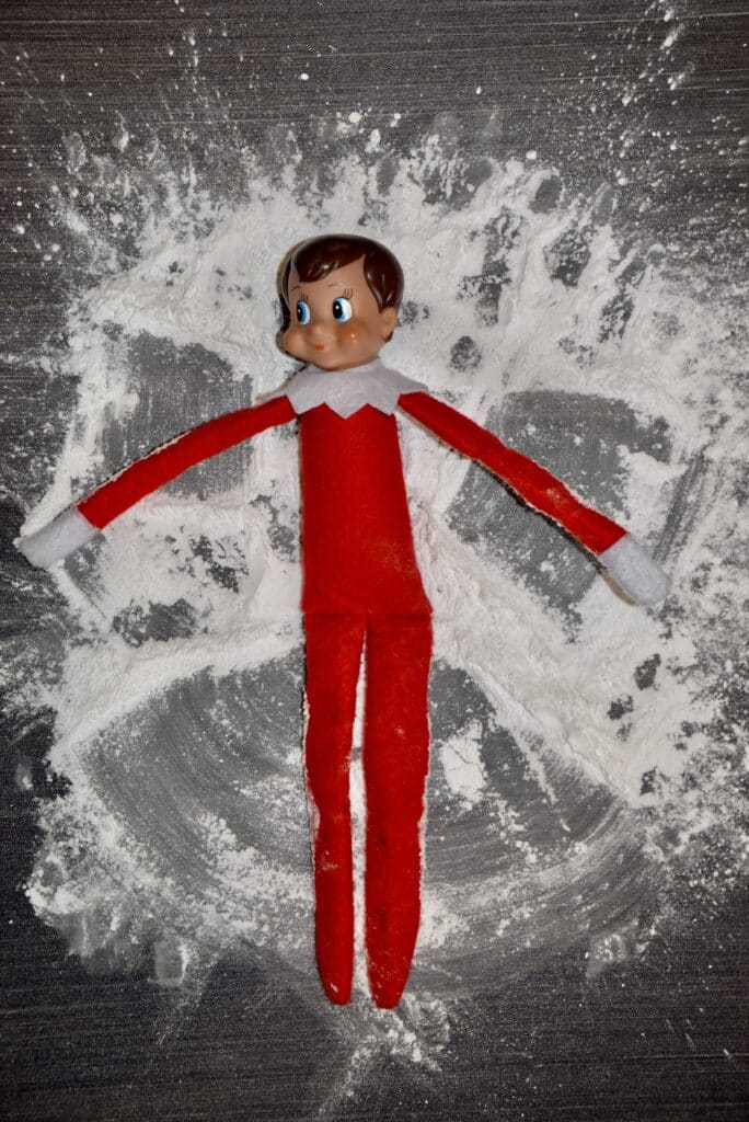 elf snow angel with icing sugar