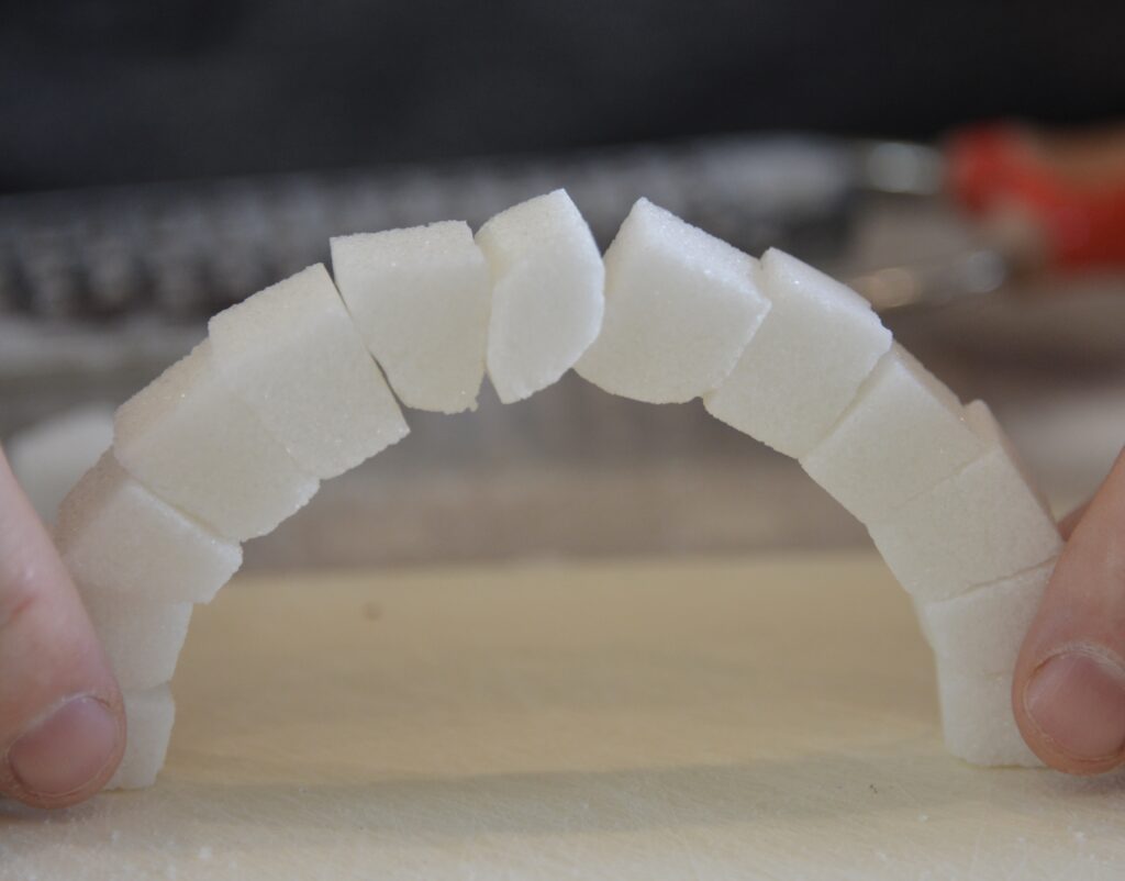 sugar cube arch for a STEM activity about making stable structures