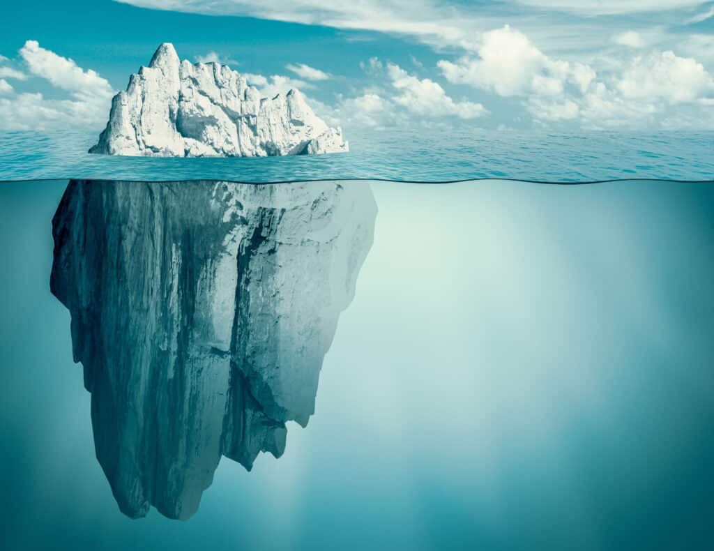 illustration of an iceberg showing 90% is underwater and 10% above the surface