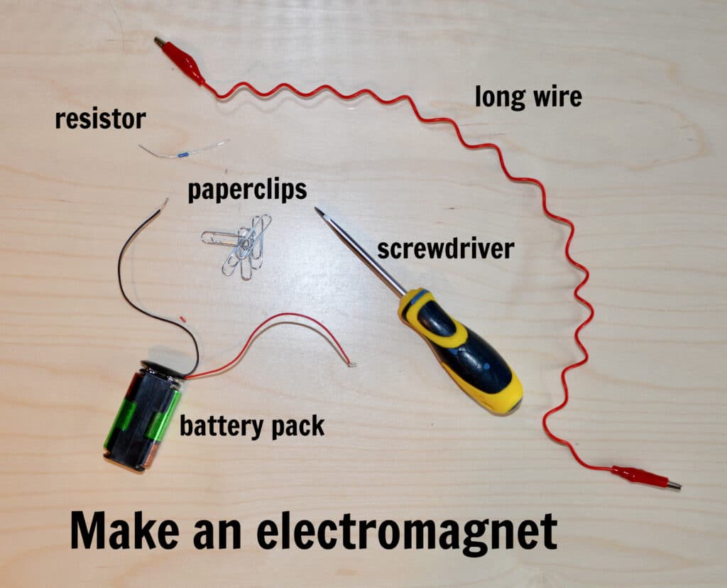 long wire, resistor, paperclips, screwdriver and battery pack for making an electromagnet