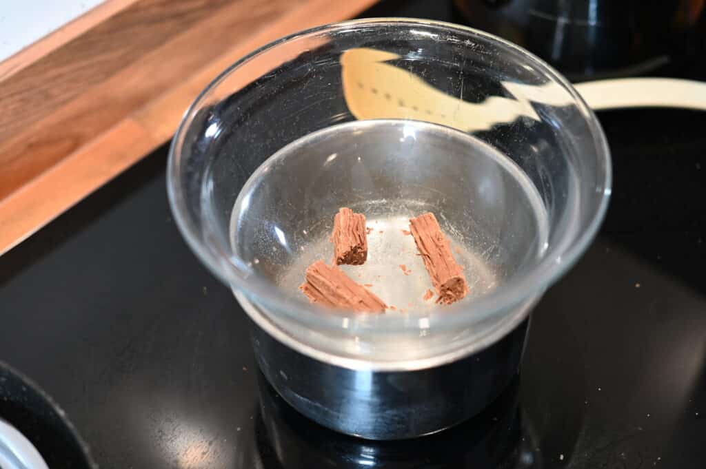 Flake in a glass bowl over simmering water