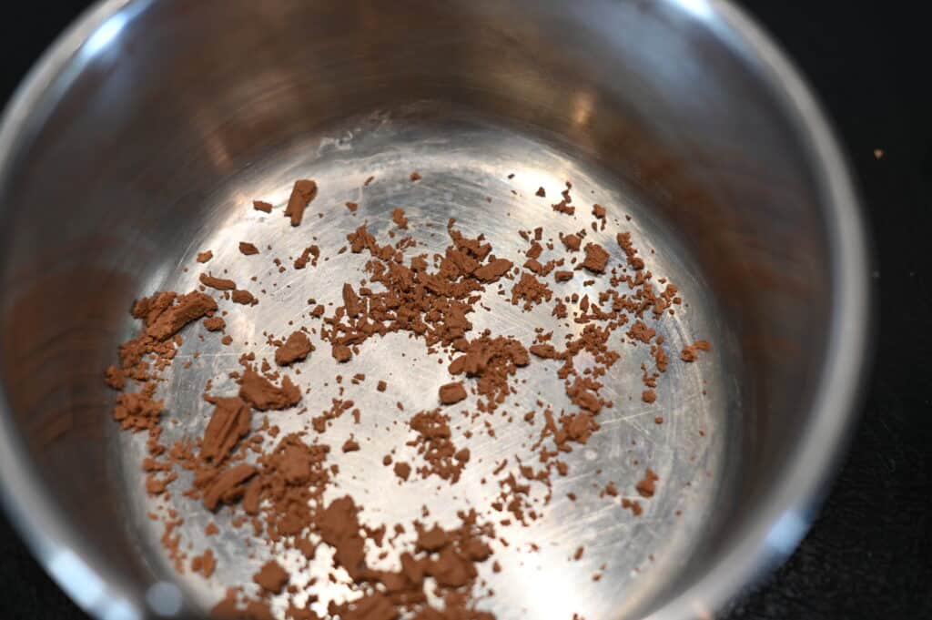 tiny bits of Cadbury flake in a pan
