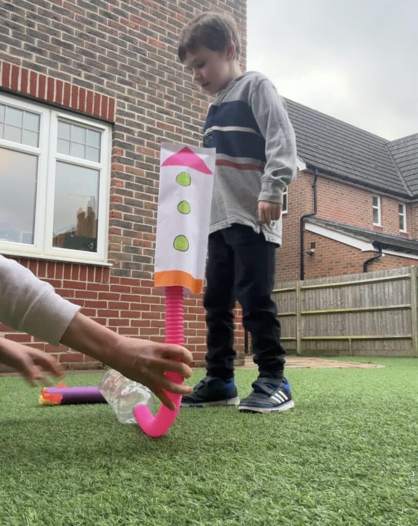 child about the jump on a DIY stomp rocket