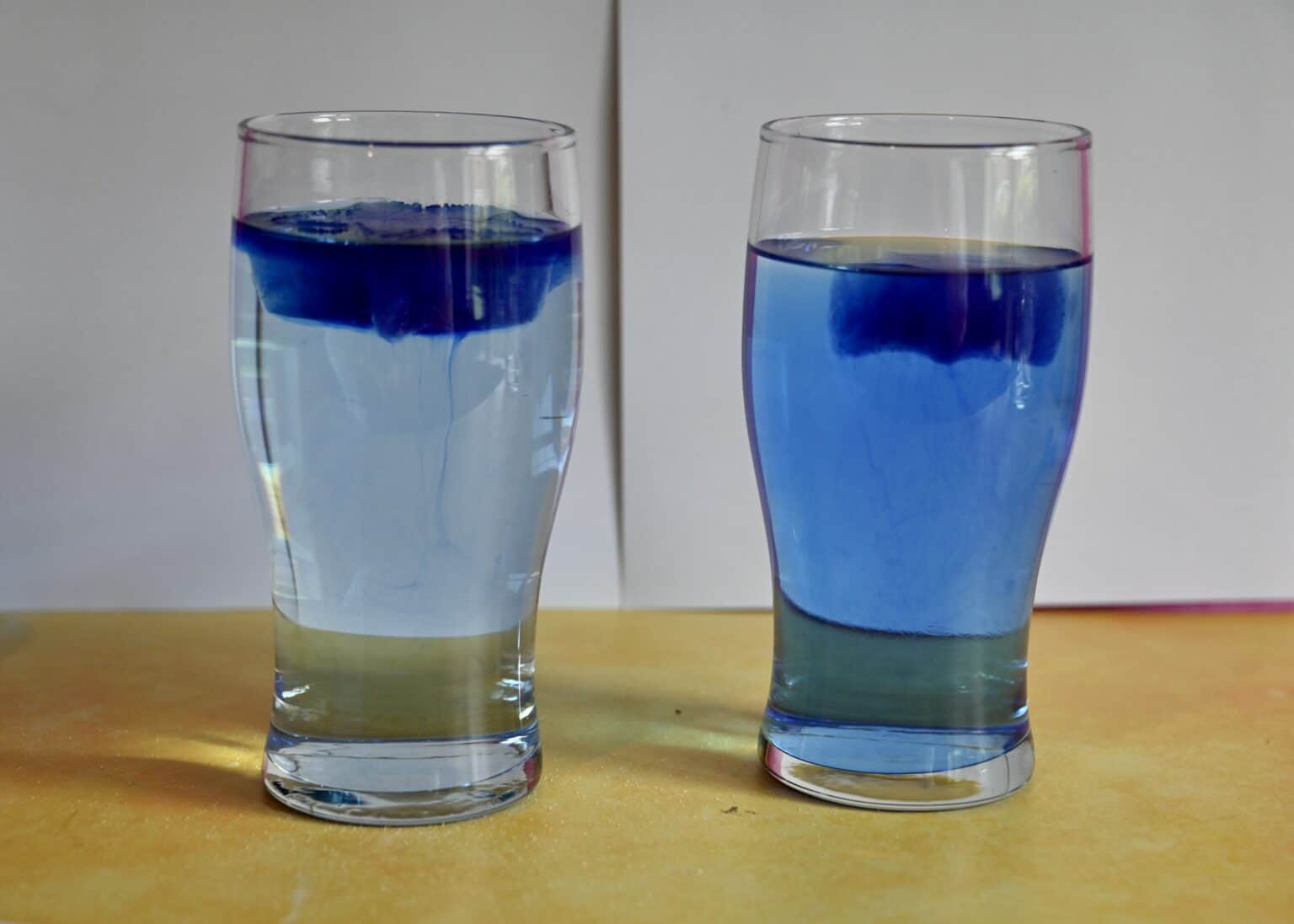 Does an ice cube melt faster in freshwater or saltwater?