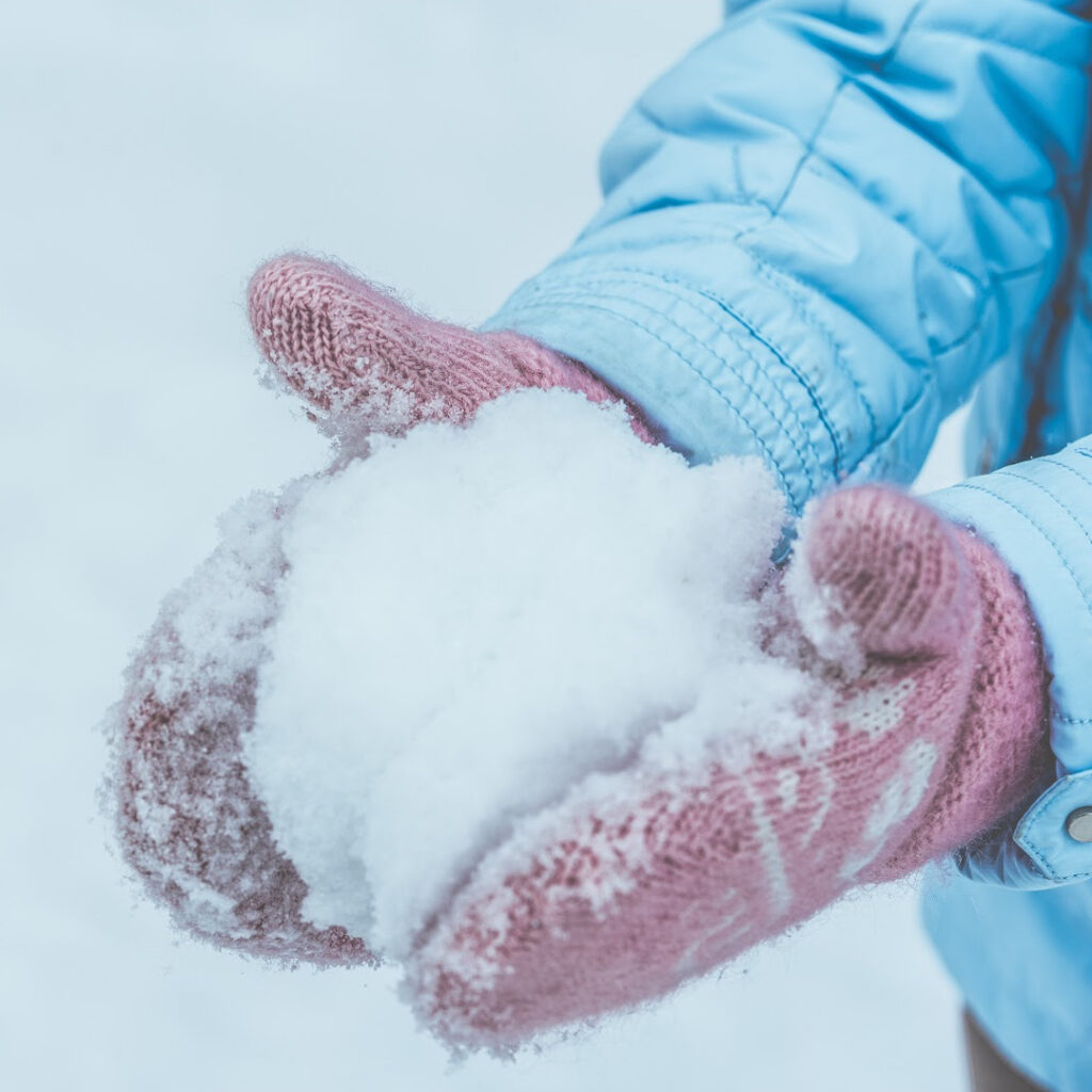 snowball in a child's hands