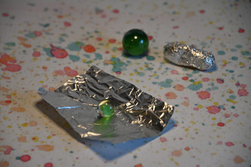 foil and a marble for a jumping bean STEM Challenge